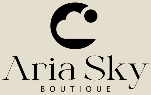 Logo of Aria Sky Boutique with a stylized letter 'C' on a beige background